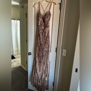 Tan/gold prom dress. Only worn once and no damage. All sequin are intact